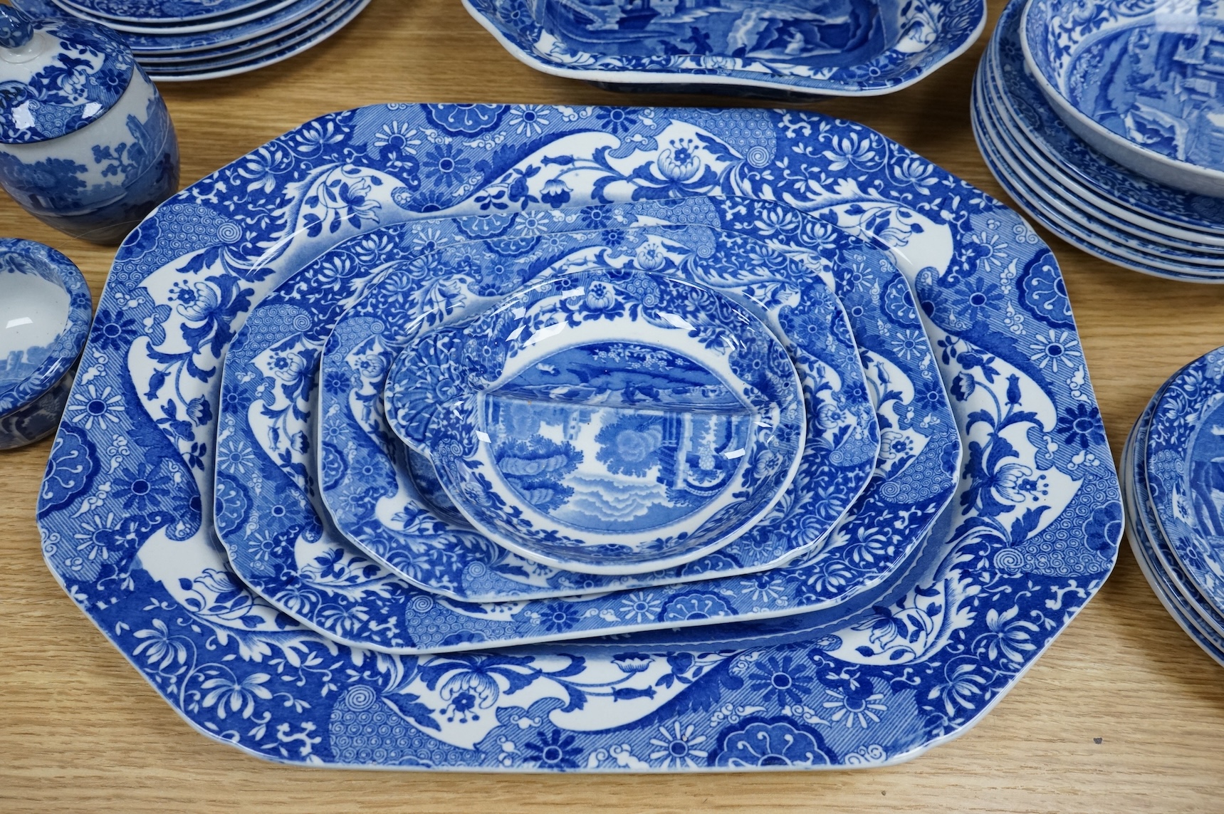 A Spode blue and white Italian service to include dinner plates, graduated bowls and platters, largest 37cm wide